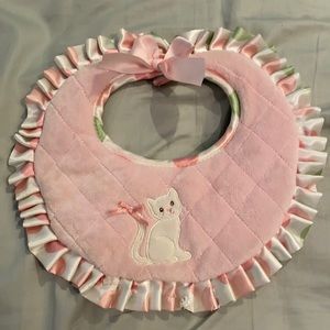 Bearington baby collection pink and green reversible bib with ribbon detail